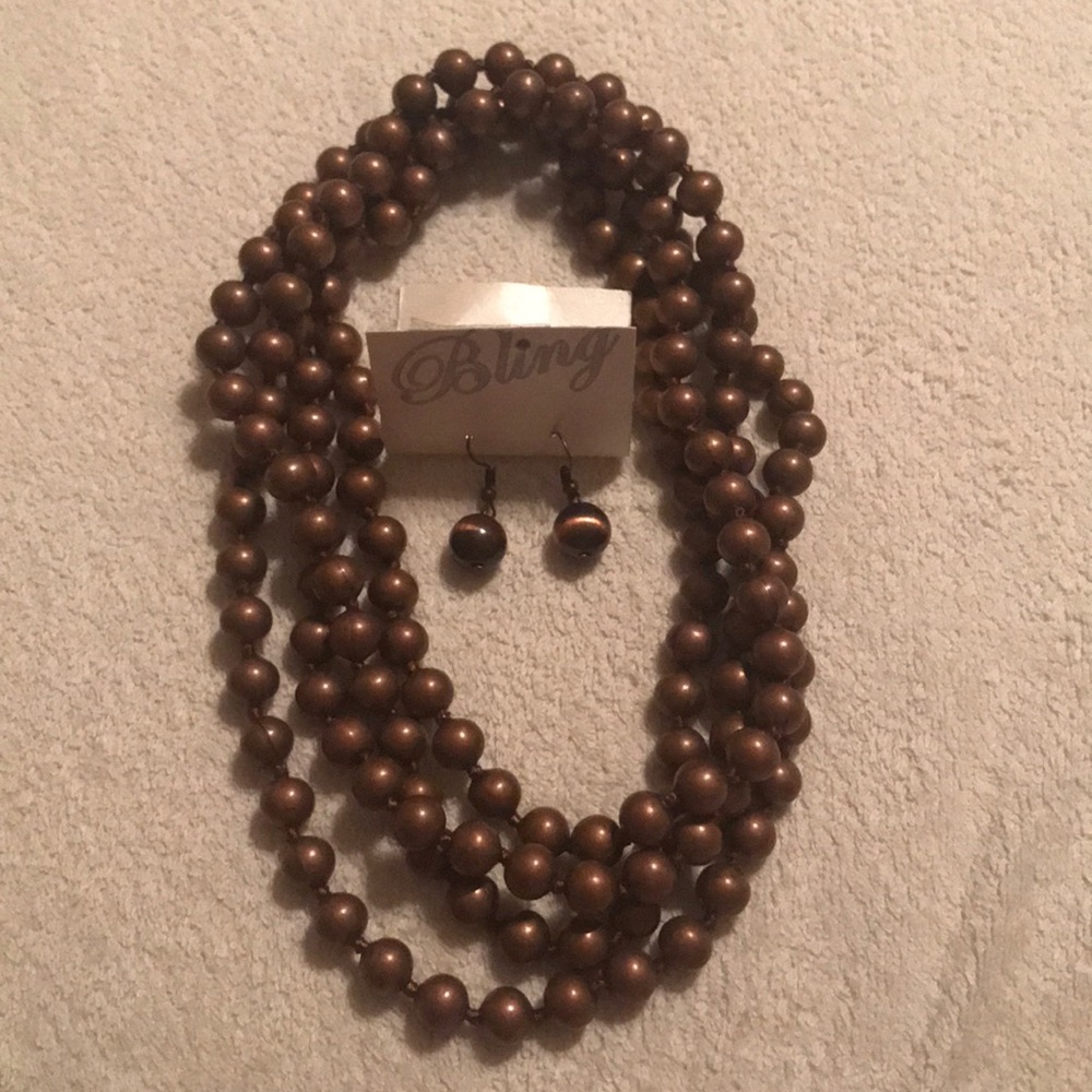 2 necklaces and matching earrings